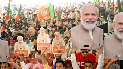 Supporters of the ruling Bharatiya Janta Party (BJP) holding cut-outs of PM Narendra Modi during an election campaign rally in Amritsar. (AFP) Supporters of the ruling Bharatiya Janta Party (BJP) holding cut-outs of PM Narendra Modi during an election campaign rally in Amritsar. (AFP)