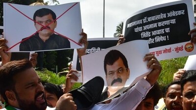 Mumbai, India – May 30, 2024: Bharatiya Janata Yuva Morch (BJYM) activists protest against NCP leader Jitendra Awhad who allegedly tore a poster carrying a picture of Dr. BR Ambedkar, in Mumbai, India, on Thursday, May 30, 2024. (Photo by Bhushan Koyande/HT Photo) Mumbai, India – May 30, 2024: Bharatiya Janata Yuva Morch (BJYM) activists protest against NCP leader Jitendra Awhad who allegedly tore a poster carrying a picture of Dr. BR Ambedkar, in Mumbai, India, on Thursday, May 30, 2024. (Photo by Bhushan Koyande/HT Photo)