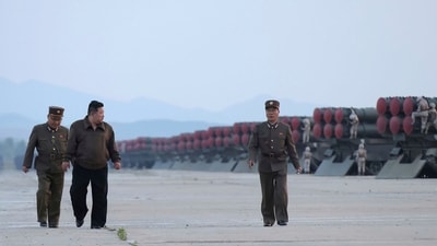 North Korean leader Kim Jong Un, second left, supervises firing drills at an undisclosed place in North Korea. (AP) North Korean leader Kim Jong Un, second left, supervises firing drills at an undisclosed place in North Korea. (AP)