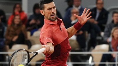 Serbia's Novak Djokovic plays a forehand return. (AFP) Serbia's Novak Djokovic plays a forehand return. (AFP)
