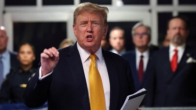 Former President Donald Trump speaks to reporters at Manhattan Criminal Court in New York. (AP)