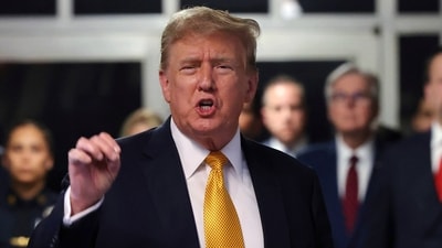 Former President Donald Trump speaks to reporters at Manhattan Criminal Court in New York. (AP)