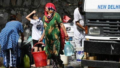 Residents fill containers with water supplied by a municipal tanker in New Delhi amid ongoing heatwave. (AFP) Residents fill containers with water supplied by a municipal tanker in New Delhi amid ongoing heatwave. (AFP)