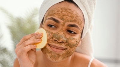 2. Regular exfoliation is essential. It helps clear away dead skin cells that can clog pores and contribute to breakouts. (Freepik ) 2. Regular exfoliation is essential. It helps clear away dead skin cells that can clog pores and contribute to breakouts. (Freepik )