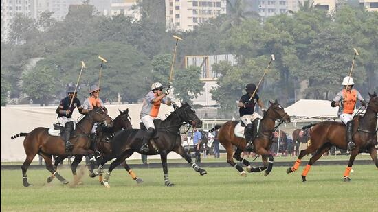 Mumbai, India - Dec. 19, 2023: Polo players of Amateur Riders’ Club in match between Mumbai polo and Nearah during Mumbai’s Polo season with the coveted ‘Christmas Cup’ at Mahalaxmi Racecourse, in Mumbai, India, on Tuesday, December 19, 2023. (Photo by Anshuman Poyrekar/ Hindustan Times) (Hindustan Times)