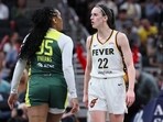INDIANAPOLIS, INDIANA - MAY 30: Caitlin Clark #22 of the Indiana Fever exchanges words with Victoria Vivians #35 of the Seattle Storm during the first quarter in the game at Gainbridge Fieldhouse on May 30, 2024, in Indianapolis, Indiana. INDIANAPOLIS, INDIANA - MAY 30: Caitlin Clark #22 of the Indiana Fever exchanges words with Victoria Vivians #35 of the Seattle Storm during the first quarter in the game at Gainbridge Fieldhouse on May 30, 2024, in Indianapolis, Indiana.