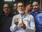 BJP candidate Ram Kripal Yadav shows his finger marked with indelible ink after casting his vote during the seventh and last phase of Lok Sabha elections, in Patna, Saturday, June 1, 2024. (PTI)