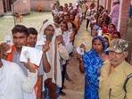People wait in queues to cast their votes at a polling station during the seventh and last phase of Lok Sabha elections, in Bihar's Kaimur district, Saturday, June 1, 2024. (PTI Photo)