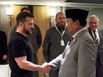 In this handout photograph taken and released by the Ukrainian Presidential Press Service on June 1, 2024, Ukraine's President Volodymyr Zelensky (FRONT-L) shakes hands with Indonesia's Defence Minister and president-elected Prabowo Subianto (FRONT-R) prior to their talks during Shangri-La Dialogue Summit in Singapore. Ukrainian President Volodymyr Zelensky arrived at a Singapore security forum on June 1 as he seeks to rally support for Kyiv while a Russian offensive gains ground. (Photo by Handout / UKRAINIAN PRESIDENTIAL PRESS SERVICE / AFP) / RESTRICTED TO EDITORIAL USE - MANDATORY CREDIT "AFP PHOTO / UKRAINIAN PRESIDENTIAL PRESS SERVICE" - NO MARKETING NO ADVERTISING CAMPAIGNS - DISTRIBUTED AS A SERVICE TO CLIENTS In this handout photograph taken and released by the Ukrainian Presidential Press Service on June 1, 2024, Ukraine's President Volodymyr Zelensky (FRONT-L) shakes hands with Indonesia's Defence Minister and president-elected Prabowo Subianto (FRONT-R) prior to their talks during Shangri-La Dialogue Summit in Singapore. Ukrainian President Volodymyr Zelensky arrived at a Singapore security forum on June 1 as he seeks to rally support for Kyiv while a Russian offensive gains ground. (Photo by Handout / UKRAINIAN PRESIDENTIAL PRESS SERVICE / AFP) / RESTRICTED TO EDITORIAL USE - MANDATORY CREDIT "AFP PHOTO / UKRAINIAN PRESIDENTIAL PRESS SERVICE" - NO MARKETING NO ADVERTISING CAMPAIGNS - DISTRIBUTED AS A SERVICE TO CLIENTS