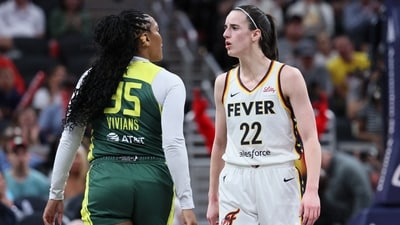 INDIANAPOLIS, INDIANA - MAY 30: Caitlin Clark #22 of the Indiana Fever exchanges words with Victoria Vivians #35 of the Seattle Storm during the first quarter in the game at Gainbridge Fieldhouse on May 30, 2024, in Indianapolis, Indiana. (Getty Images via AFP) INDIANAPOLIS, INDIANA - MAY 30: Caitlin Clark #22 of the Indiana Fever exchanges words with Victoria Vivians #35 of the Seattle Storm during the first quarter in the game at Gainbridge Fieldhouse on May 30, 2024, in Indianapolis, Indiana. (Getty Images via AFP)