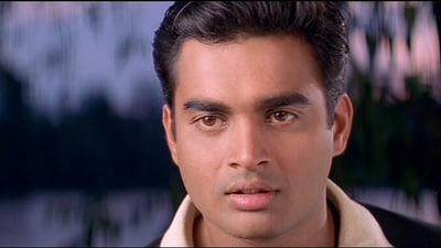 R Madhavan soon developed an image as a romantic hero with notable roles in two of the highest-grossing Tamil films of 2001, Gautham Vasudev Menon's directorial debut Minnale and Madras Talkies' Dumm Dumm Dumm. 