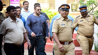Bollywood actor Salman Khan, guarded by security personnel, leaves a polling booth after casting his ballot to vote in Mumbai on May 20, 2024. (AFP) Bollywood actor Salman Khan, guarded by security personnel, leaves a polling booth after casting his ballot to vote in Mumbai on May 20, 2024. (AFP)