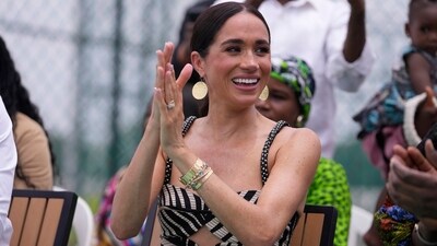 Meghan Markle watches her husband Prince Harry play in an exhibition sitting volleyball match, in Abuja, Nigeria, Saturday, May 11, 2024. Prince Harry and his wife Meghan are in Nigeria to champion the Invictus Games, which he founded to aid the rehabilitation of wounded and sick servicemembers and veterans. (AP Photo/Sunday Alamba) (AP) Meghan Markle watches her husband Prince Harry play in an exhibition sitting volleyball match, in Abuja, Nigeria, Saturday, May 11, 2024. Prince Harry and his wife Meghan are in Nigeria to champion the Invictus Games, which he founded to aid the rehabilitation of wounded and sick servicemembers and veterans. (AP Photo/Sunday Alamba) (AP)