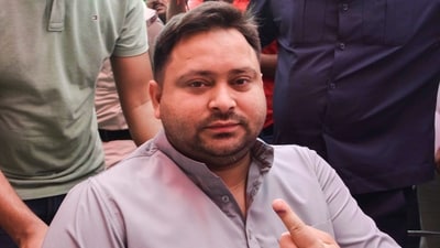 Rashtriya Janata Dal (RJD) leader Tejashwi Yadav exhibits his finger marked with indelible ink after voting during the last phase of the Lok Sabha elections in Bihar's Patna. (PTI) Rashtriya Janata Dal (RJD) leader Tejashwi Yadav exhibits his finger marked with indelible ink after voting during the last phase of the Lok Sabha elections in Bihar's Patna. (PTI)
