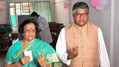 BJP candidate Ravi Shankar Prasad, accompanied by his wife, casts his vote during the seventh and final phase of Lok Sabha elections in Patna. (PTI) BJP candidate Ravi Shankar Prasad, accompanied by his wife, casts his vote during the seventh and final phase of Lok Sabha elections in Patna. (PTI)