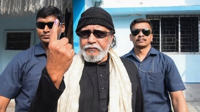 Actor and BJP leader Mithun Chakraborty displays his inked finger after voting at a polling booth during the seventh and last phase of Lok Sabha elections in Kolkata. (PTI) Actor and BJP leader Mithun Chakraborty displays his inked finger after voting at a polling booth during the seventh and last phase of Lok Sabha elections in Kolkata. (PTI)