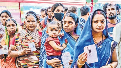 Voters stand in a queue to cast their vote at a polling booth during the last phase of the Lok Sabha elections, in Dumka on Saturday. (ANI) Voters stand in a queue to cast their vote at a polling booth during the last phase of the Lok Sabha elections, in Dumka on Saturday. (ANI)