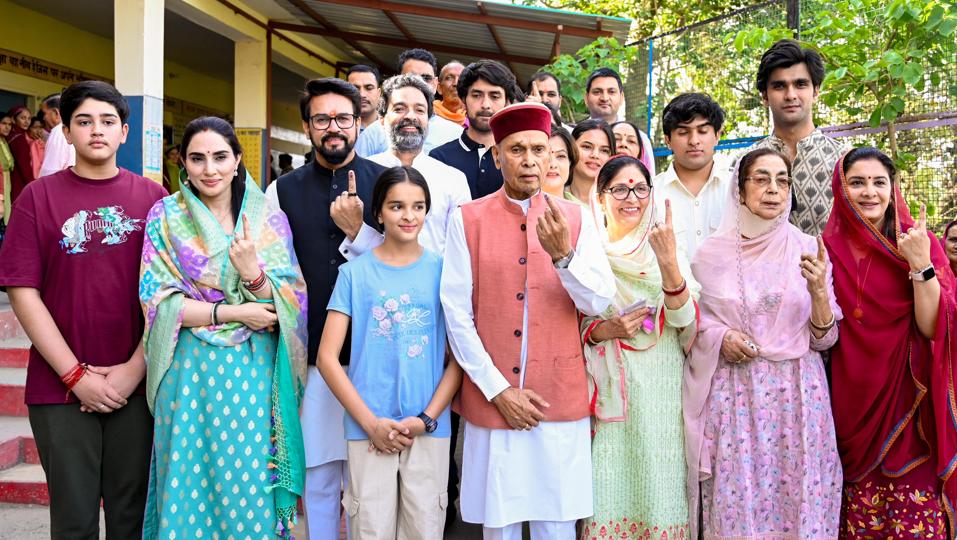 Union minister and BJP candidate Anurag Thakur (third from left) along with former Himachal Pradesh chief minister and his father Prem Kumar Dhumal and other family members after casting their vote at Hamirpur on Saturday. (HT Photo) Union minister and BJP candidate Anurag Thakur (third from left) along with former Himachal Pradesh chief minister and his father Prem Kumar Dhumal and other family members after casting their vote at Hamirpur on Saturday. (HT Photo)