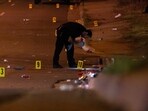 This image, courtesy of News 5 Cleveland, shows an officer of the Akron Police Department investigating a shooting that happened overnight in Akron, Ohio, Sunday This image, courtesy of News 5 Cleveland, shows an officer of the Akron Police Department investigating a shooting that happened overnight in Akron, Ohio, Sunday