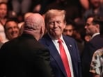 Former President Donald Trump, center right, smiles toward Dana White, front left, while attending the UFC 302 mixed martial arts event Saturday, June 1, 2024, in Newark, N.J. (AP Photo/Frank Franklin II) Former President Donald Trump, center right, smiles toward Dana White, front left, while attending the UFC 302 mixed martial arts event Saturday, June 1, 2024, in Newark, N.J. (AP Photo/Frank Franklin II)