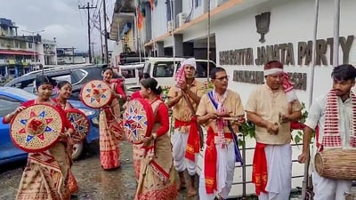Itanagar, Jun 02 (ANI): Artists dressed in traditional Assamese attire perform 'Bihu dance' as they celebrate Bharatiya Janata Party (BJP) crossing the halfway mark during the ongoing vote counting for the Arunachal Pradesh Assembly elections, at the party office in Itanagar on Sunday. Itanagar, Jun 02 (ANI): Artists dressed in traditional Assamese attire perform 'Bihu dance' as they celebrate Bharatiya Janata Party (BJP) crossing the halfway mark during the ongoing vote counting for the Arunachal Pradesh Assembly elections, at the party office in Itanagar on Sunday.