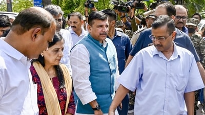 Delhi CM and AAP national convener Arvind Kejriwal with his wife Sunita Kejriwal and party leader Sanjay Singh. Delhi CM and AAP national convener Arvind Kejriwal with his wife Sunita Kejriwal and party leader Sanjay Singh.