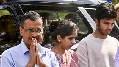 Delhi CM and AAP national convener Arvind Kejriwal with his family members after paying tribute to Mahatma Gandhi at Raj Ghat in New Delhi on Sunday. (ANI)