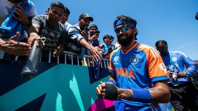 India's Hardik Pandya greets fans during an exhibition cricket match between Bangladesh and India at the Nassau County International Cricket Stadium (AP) India's Hardik Pandya greets fans during an exhibition cricket match between Bangladesh and India at the Nassau County International Cricket Stadium (AP)