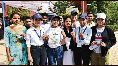 First-time voters showing their inked fingers after casting their votes at Government Model High School in Dhanas, Chandigarh, on Saturday. (Keshav Singh/ HT) First-time voters showing their inked fingers after casting their votes at Government Model High School in Dhanas, Chandigarh, on Saturday. (Keshav Singh/ HT)