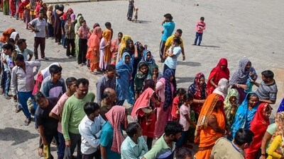 Voters queue up to cast their ballots at a polling station during the seventh and final phase of voting in India's general election in Chandigarh on June 1, 2024. (Photo by AFP) (AFP) Voters queue up to cast their ballots at a polling station during the seventh and final phase of voting in India's general election in Chandigarh on June 1, 2024. (Photo by AFP) (AFP)