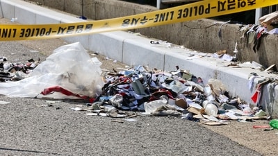 The trash from a balloon presumably sent by North Korea, is seen behind police tape in Incheon, South Korea, (AP) The trash from a balloon presumably sent by North Korea, is seen behind police tape in Incheon, South Korea, (AP)