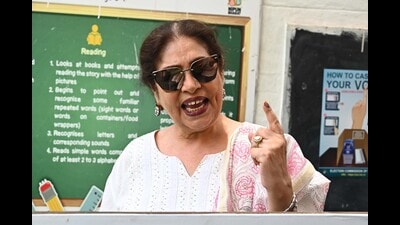 MP Kirron Kher after voting at Sector 7, Chandigarh, on Saturday. (Keshav Singh/HT)