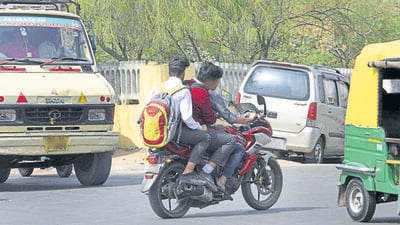 Three school students seen driving a bike in the Capital. (HT Archive) Three school students seen driving a bike in the Capital. (HT Archive)