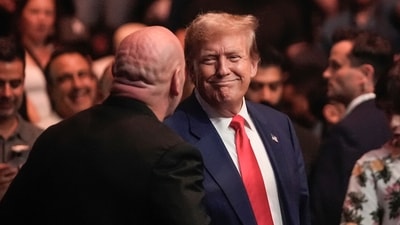 Former President Donald Trump, center right, smiles toward Dana White, front left, while attending the UFC 302 mixed martial arts event Saturday, June 1, 2024, in Newark, N.J. (AP Photo/Frank Franklin II) (AP) Former President Donald Trump, center right, smiles toward Dana White, front left, while attending the UFC 302 mixed martial arts event Saturday, June 1, 2024, in Newark, N.J. (AP Photo/Frank Franklin II) (AP)