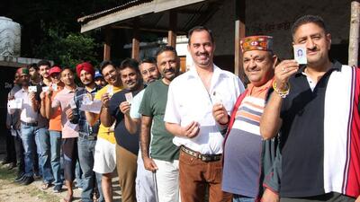 Voters queueing up outside a polling booth in Himachal. (HT Photo) Voters queueing up outside a polling booth in Himachal. (HT Photo)