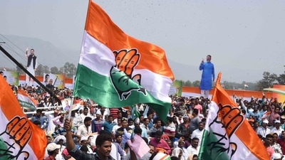 Congress supporters with Congress flags ahead of a rally. (File Photo)