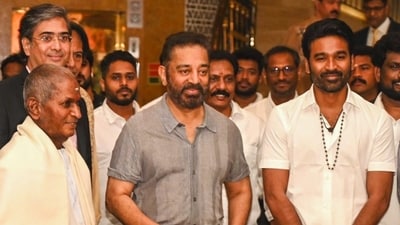 Ilaiyaraaja, Kamal Haasan and Dhanush pose for the camera. Ilaiyaraaja, Kamal Haasan and Dhanush pose for the camera.