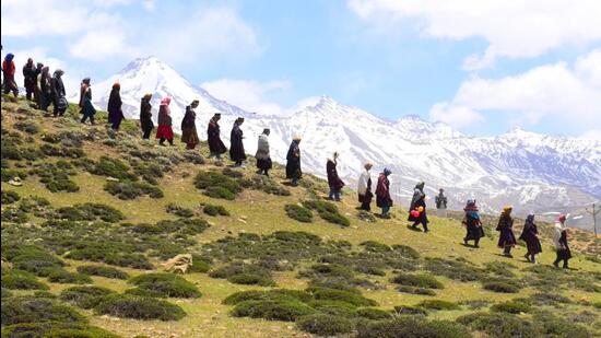 Voters headed to the polling booth in Tashigang, Himachal. (Aqil Khan/HT)