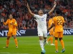 France's Kylian Mbappe, centre, celebrates after scoring his side's opening goal during the Euro 2024 group B qualifying game