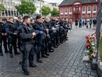 German police officers commemorate a colleague in Mannheim Germany, after learning that a police officer, who was stabbed two days ago there has died on Sunday German police officers commemorate a colleague in Mannheim Germany, after learning that a police officer, who was stabbed two days ago there has died on Sunday
