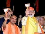 Prime Minister Narendra Modi and UP chief minister Yogi Adityanath during an election campaign (HT File)