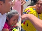 Teenage girl selling fruit in Battery Park, NYC, handcuffed by Parks Department employee for unlicensed cart; bystanders intervene demanding female worker. Video sparks outrage as onlookers try to free girl from officers. Teenage girl selling fruit in Battery Park, NYC, handcuffed by Parks Department employee for unlicensed cart; bystanders intervene demanding female worker. Video sparks outrage as onlookers try to free girl from officers.