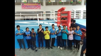 12 students of Josh Boxing Academy of Malihabad score bagged medals at a district-level tournament. (HT Photo)