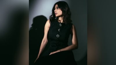 She styled her luscious long tresses into soft curls and left them open in the middle partition to let them cascade beautifully down her shoulders and complete her stylish look perfectly. (Instagram/@imouniroy) She styled her luscious long tresses into soft curls and left them open in the middle partition to let them cascade beautifully down her shoulders and complete her stylish look perfectly. (Instagram/@imouniroy)