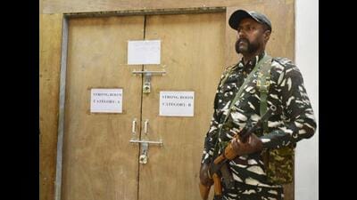 A security personnel standing guard outside the strong room where electronic voting machines (EVMs) have been kept in Amritsar on Monday. (Sameer Sehgal/HT) A security personnel standing guard outside the strong room where electronic voting machines (EVMs) have been kept in Amritsar on Monday. (Sameer Sehgal/HT)