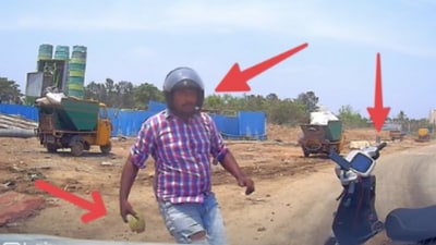 The Bengaluru man's dash camera footage captures the motorist approaching the car. (@DJain1989) The Bengaluru man's dash camera footage captures the motorist approaching the car. (@DJain1989)