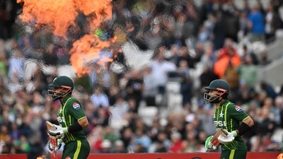 Pakistan's Babar Azam (L) and Pakistan's Mohammad Rizwan (R) walk out to bat. (AFP) Pakistan's Babar Azam (L) and Pakistan's Mohammad Rizwan (R) walk out to bat. (AFP)