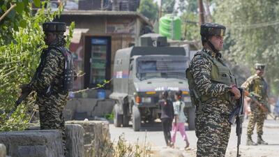 CRPF personnel stand guard during an encounter between security forces and militants, in Pulwama district. (PTI) CRPF personnel stand guard during an encounter between security forces and militants, in Pulwama district. (PTI)