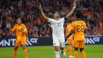 France's Kylian Mbappe, centre, celebrates after scoring his side's opening goal during the Euro 2024 group B qualifying game (AP) France's Kylian Mbappe, centre, celebrates after scoring his side's opening goal during the Euro 2024 group B qualifying game (AP)