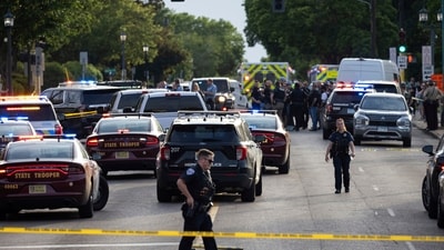 Law enforcement gathers on Franklin Avenue in Minneapolis, Thursday, May 30, 2024. Three people, including the suspected gunman, are dead after a mass shooting Thursday at a Minneapolis apartment complex, police said. Two police officers were also injured and hospitalized after the shooting in the south Minneapolis neighborhood of Whittier. (Ben Hovland/Minnesota Public Radio via AP) (AP) Law enforcement gathers on Franklin Avenue in Minneapolis, Thursday, May 30, 2024. Three people, including the suspected gunman, are dead after a mass shooting Thursday at a Minneapolis apartment complex, police said. Two police officers were also injured and hospitalized after the shooting in the south Minneapolis neighborhood of Whittier. (Ben Hovland/Minnesota Public Radio via AP) (AP)